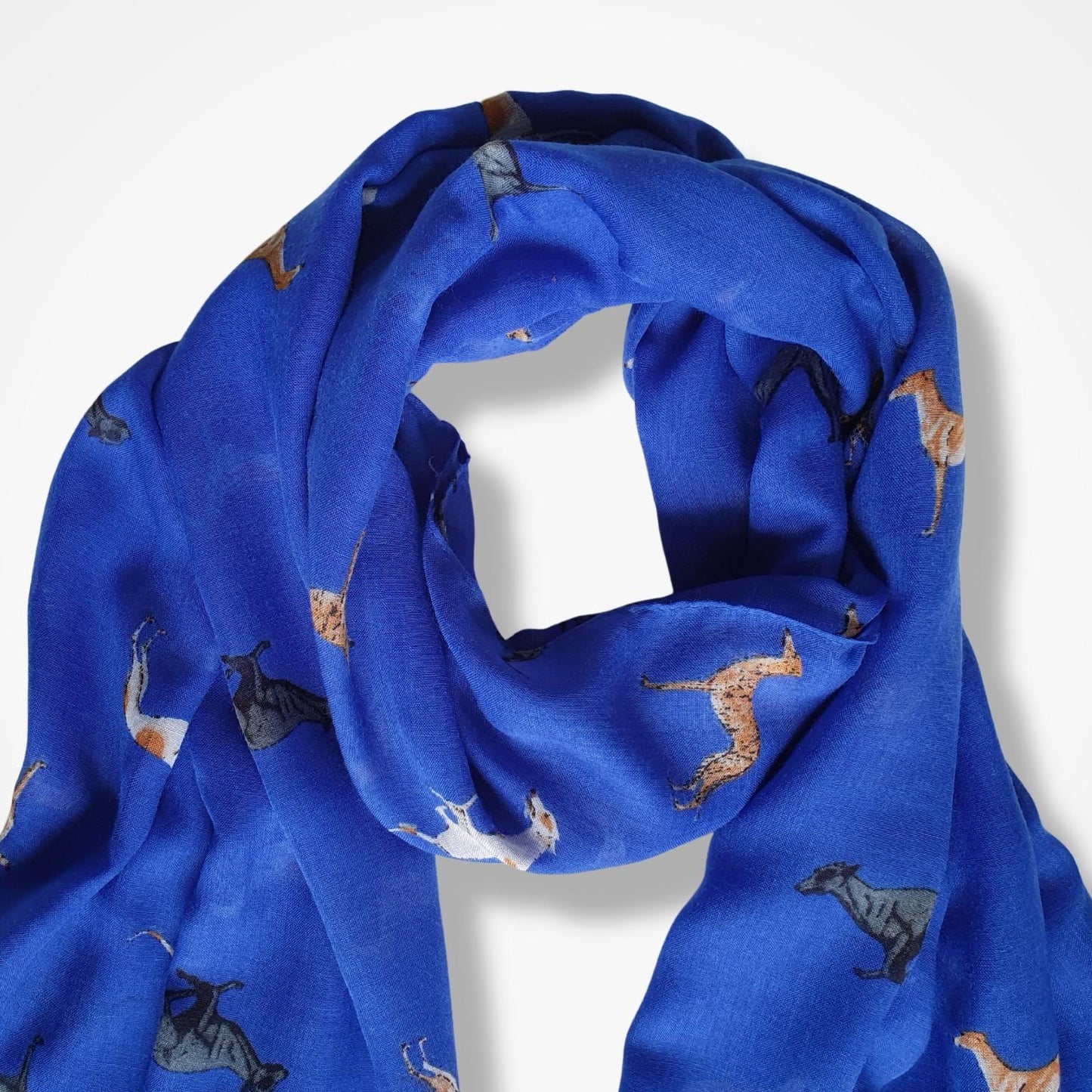 Blue scarf with running greyhound patterns on a white background