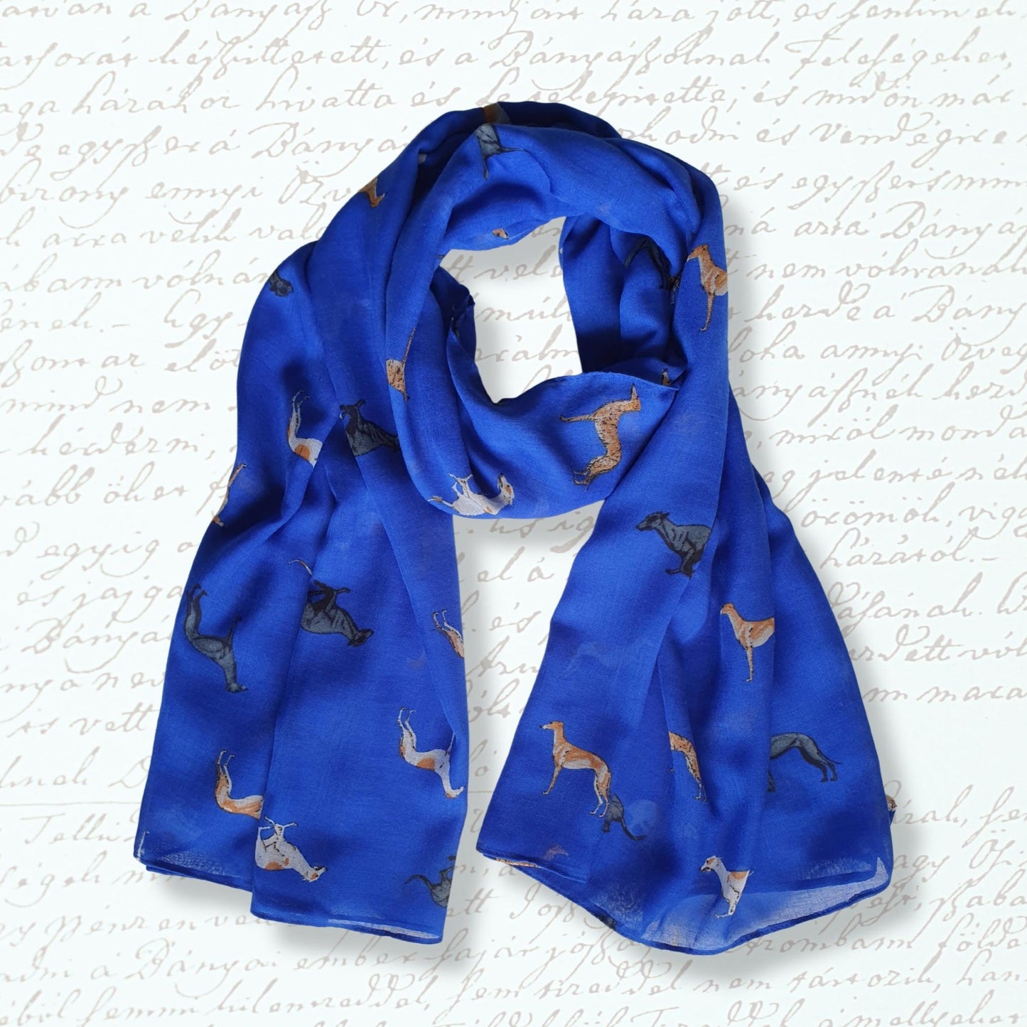 Blue scarf with greyhound prints on a textured white background