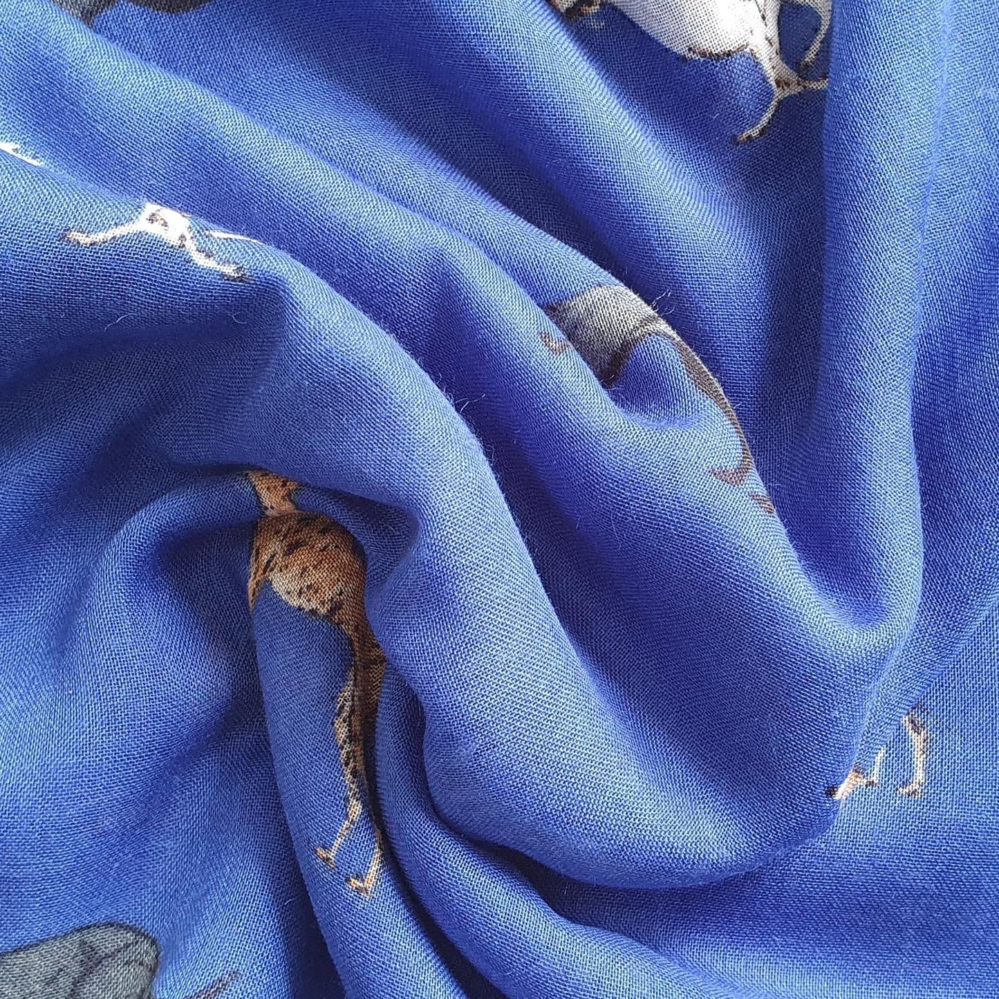 Blue fabric with whippet dog prints