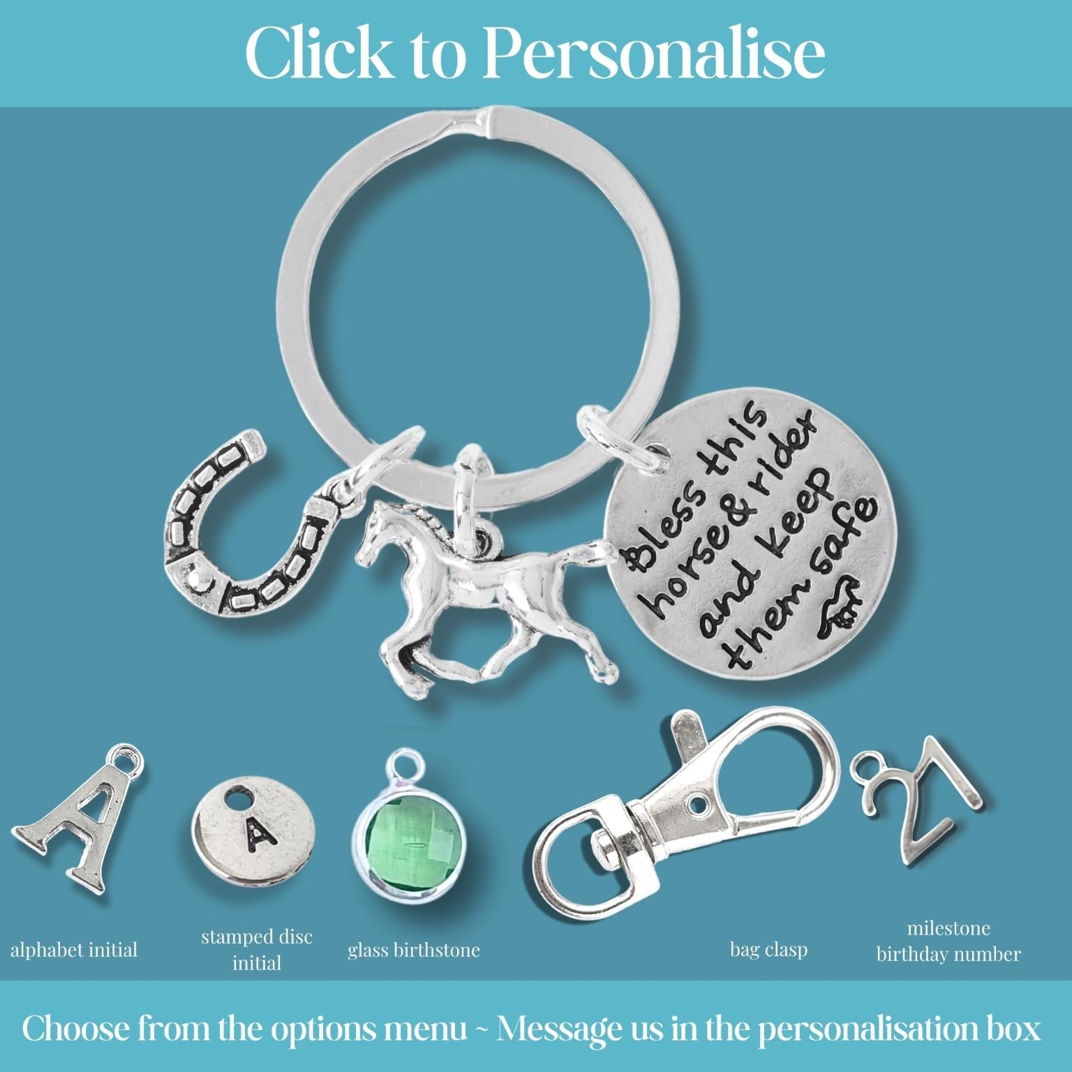 Silver keychain with horse and horseshoe charm on a blue background