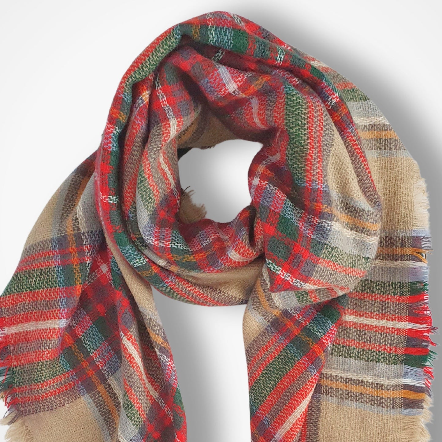 Plaid scarf with red, green, and beige colors on a white background