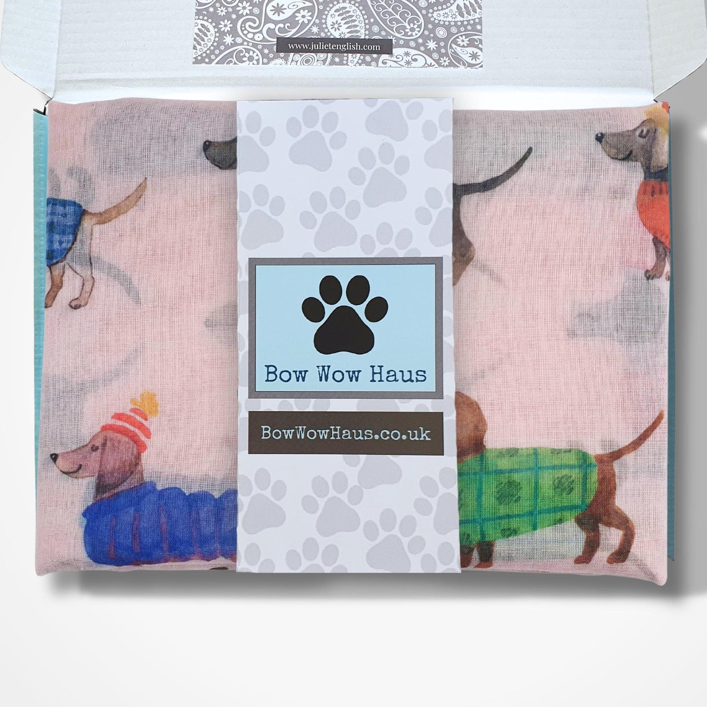 Gift boxed scarf with 'Bow Wow Haus' branding on a white background