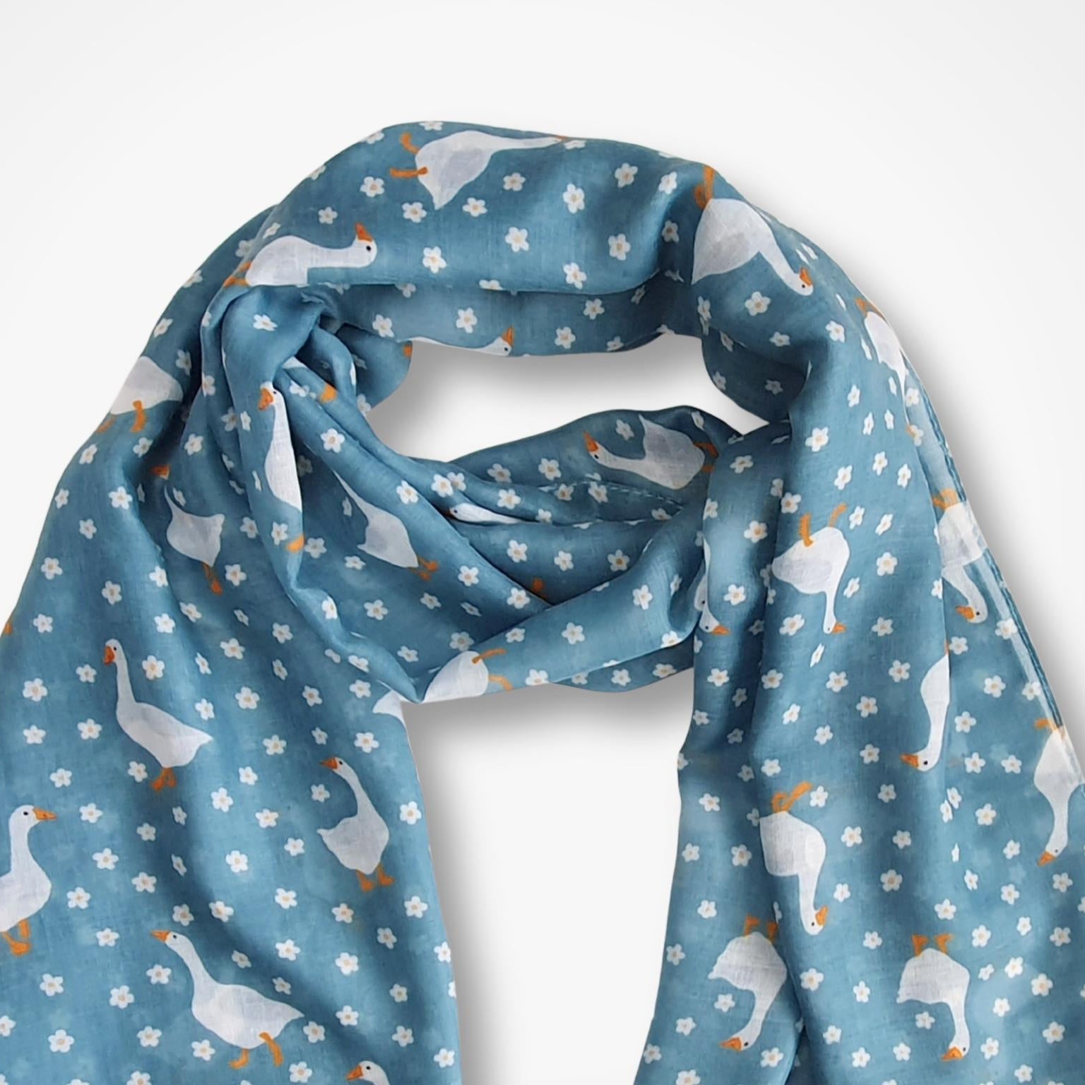 Blue scarf with goose pattern on a white background