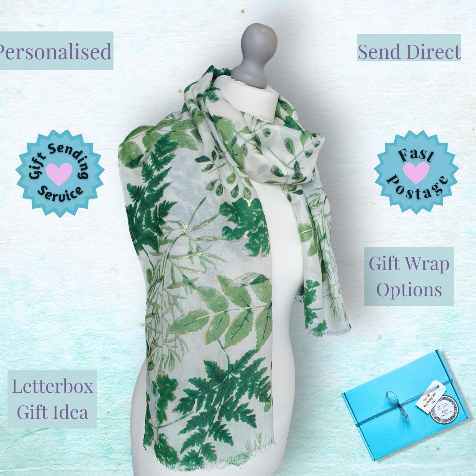 Mannequin wearing a green leaf-patterned scarf with promotional text on a light blue background