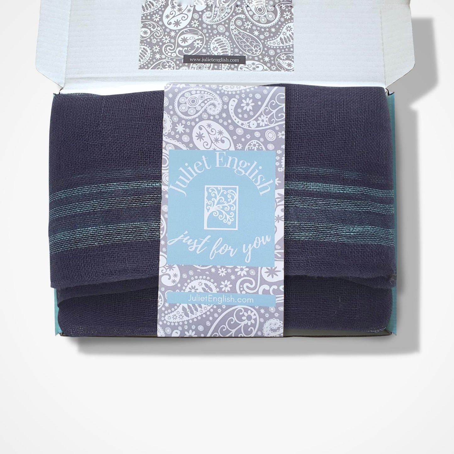 navy scarf in a box with a Juliet English  label on a white background