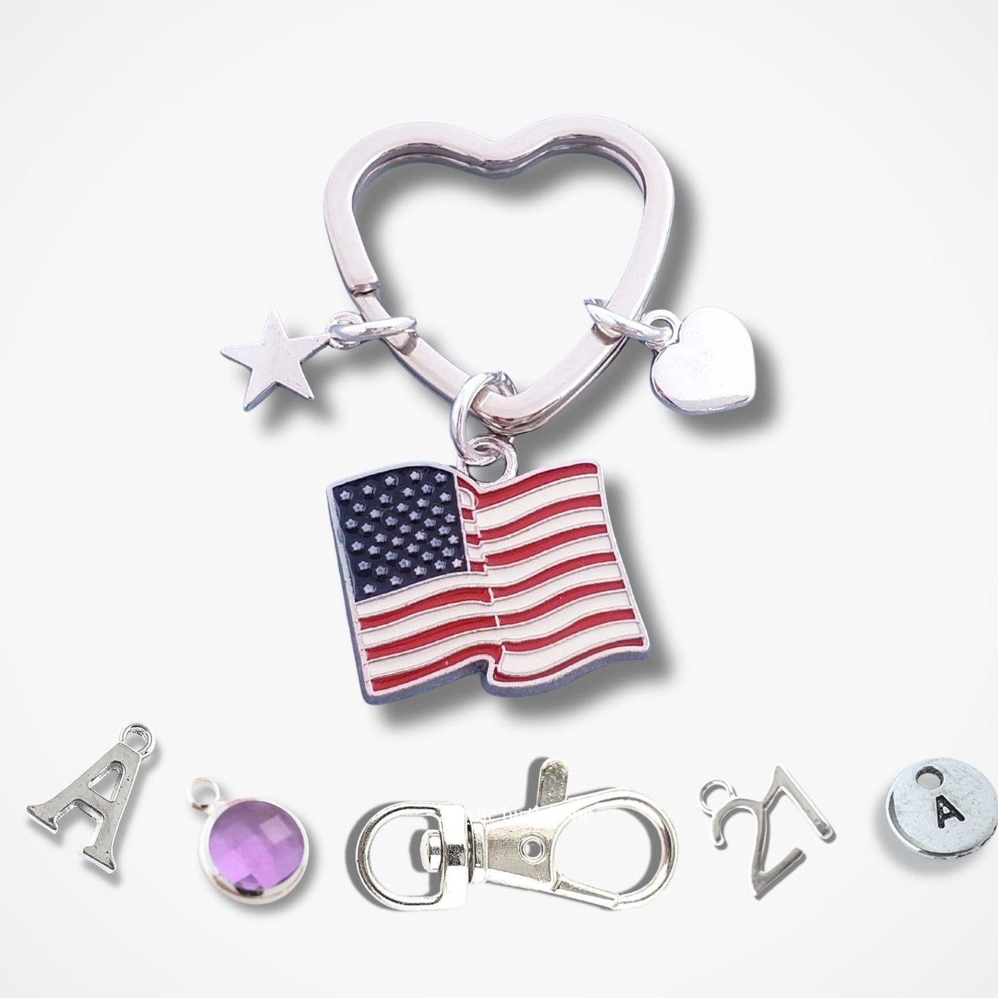Keychain with American flag charm and other decorative elements on a white background