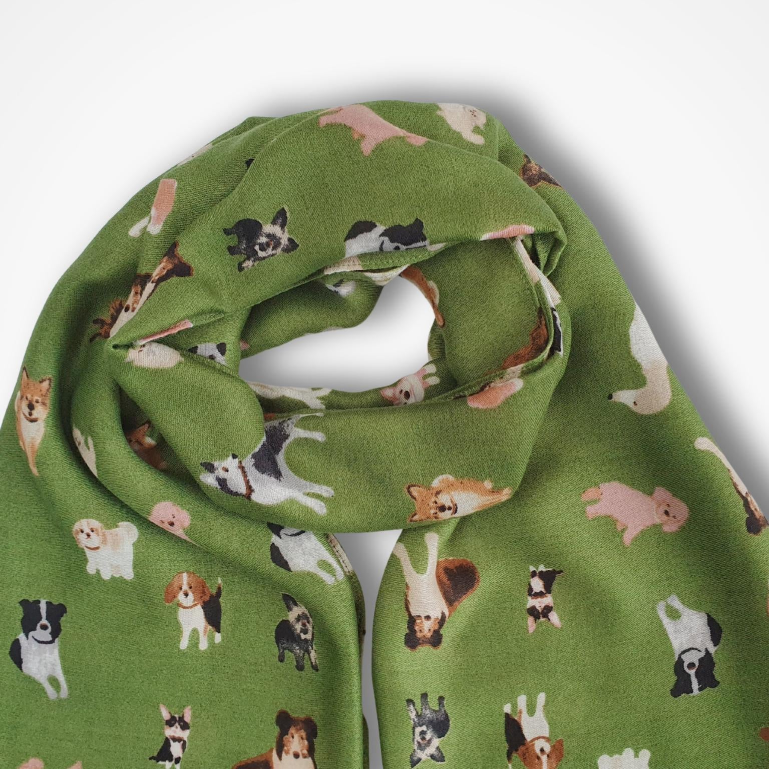 Green scarf with dog pattern on a white background
