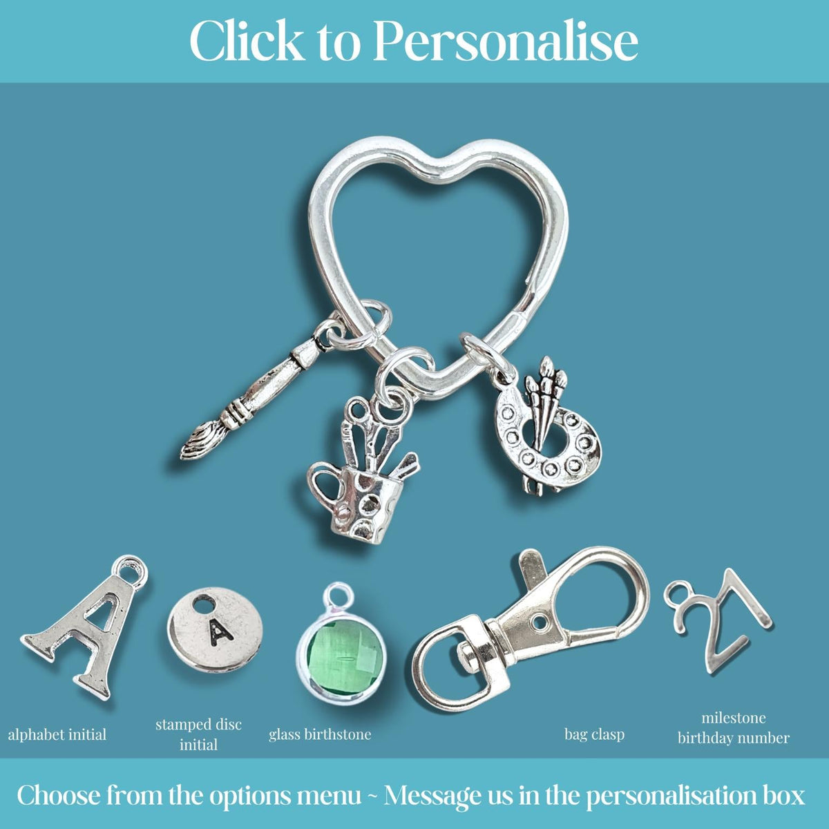 A silver keychain or bag charm set displayed on a teal background with text reading 'Click to Personalise' and options for custom initial letters, glass birthstone, and milestone numbers. The main item is a heart-shaped key ring with dangling charms including a paintbrush, paint palette, utensil pot, and clasp.