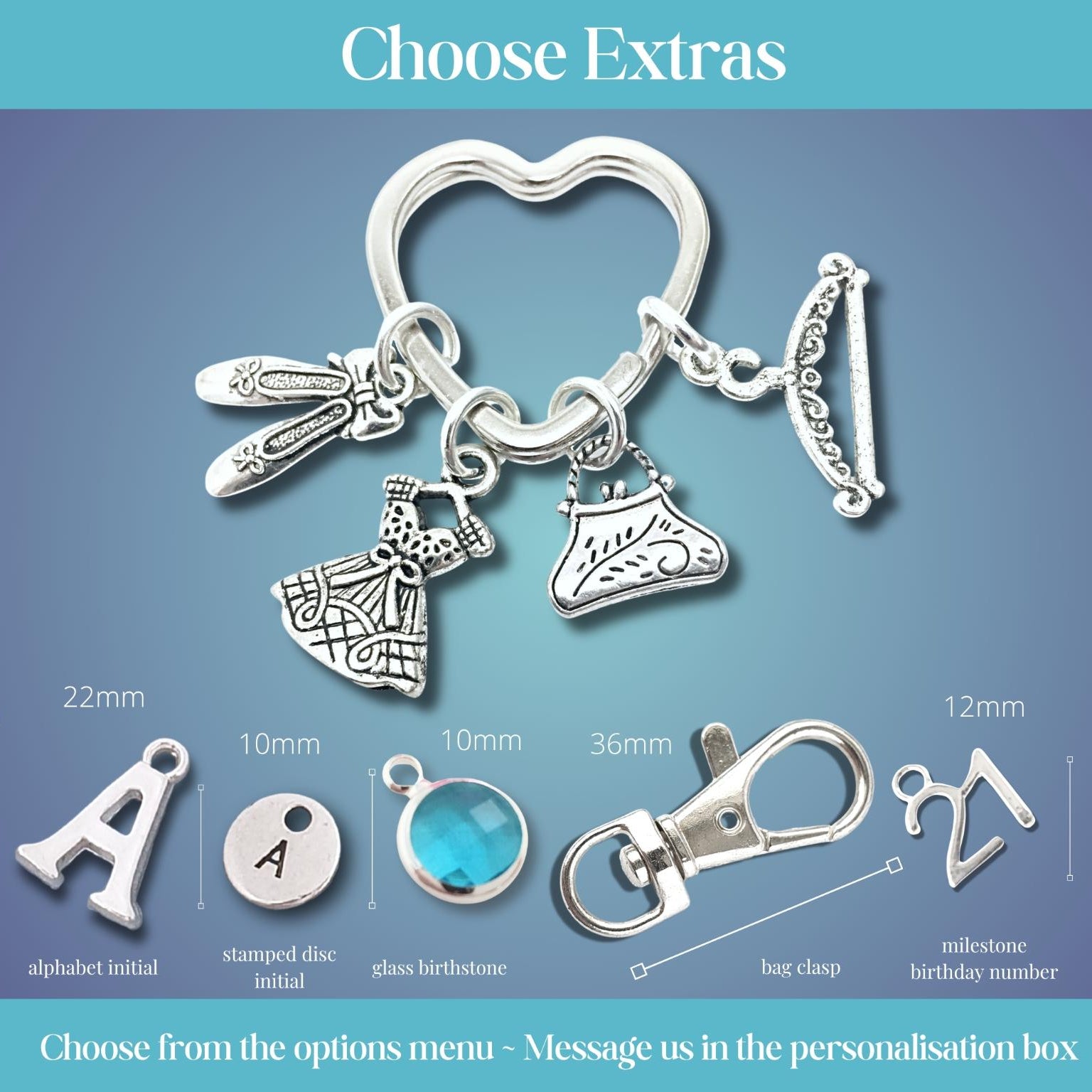 Silver keychain customization options displayed on a blue gradient background, featuring a heart-shaped ring with charms, plus size and shape options for alphabet initial, stamped disc initial, glass birthstone, bag clasp, and milestone birthday number.