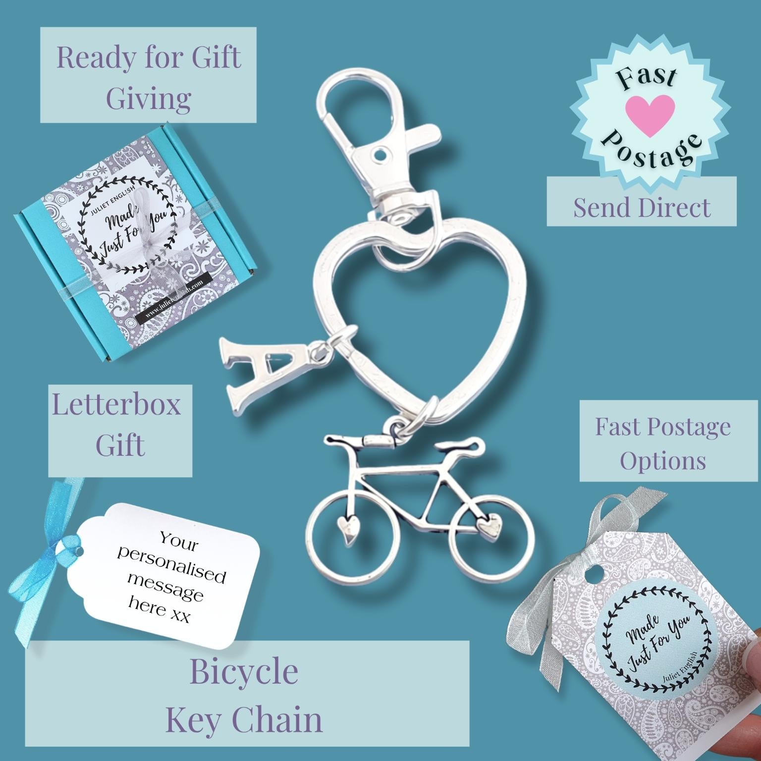 Silver bicycle keychain with a heart-shaped clasp and letter 'A' charm, displayed on a teal background with gift packaging options, postage badges, and a hand holding a silver tag.