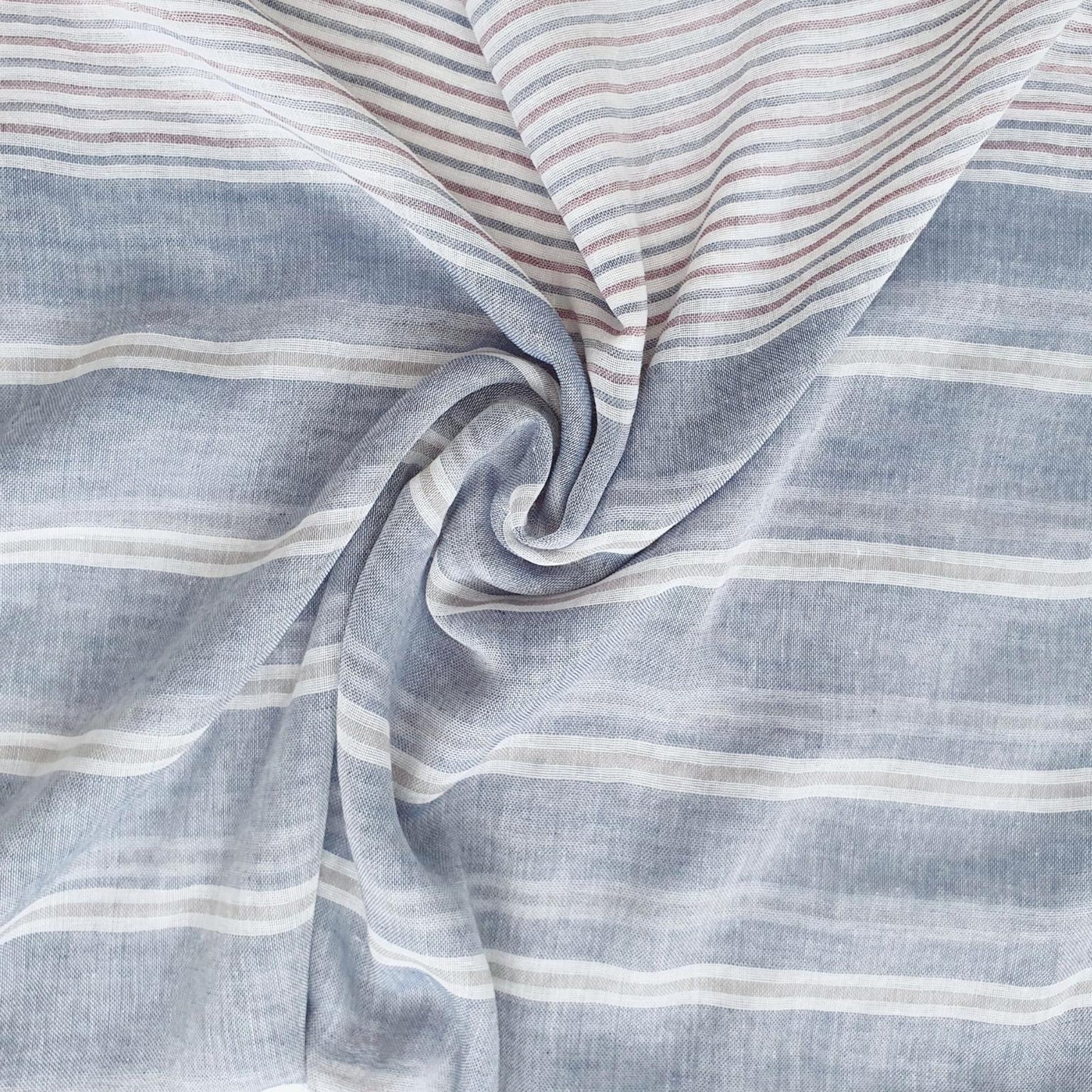 Close-up of striped fabric with blue and white lines