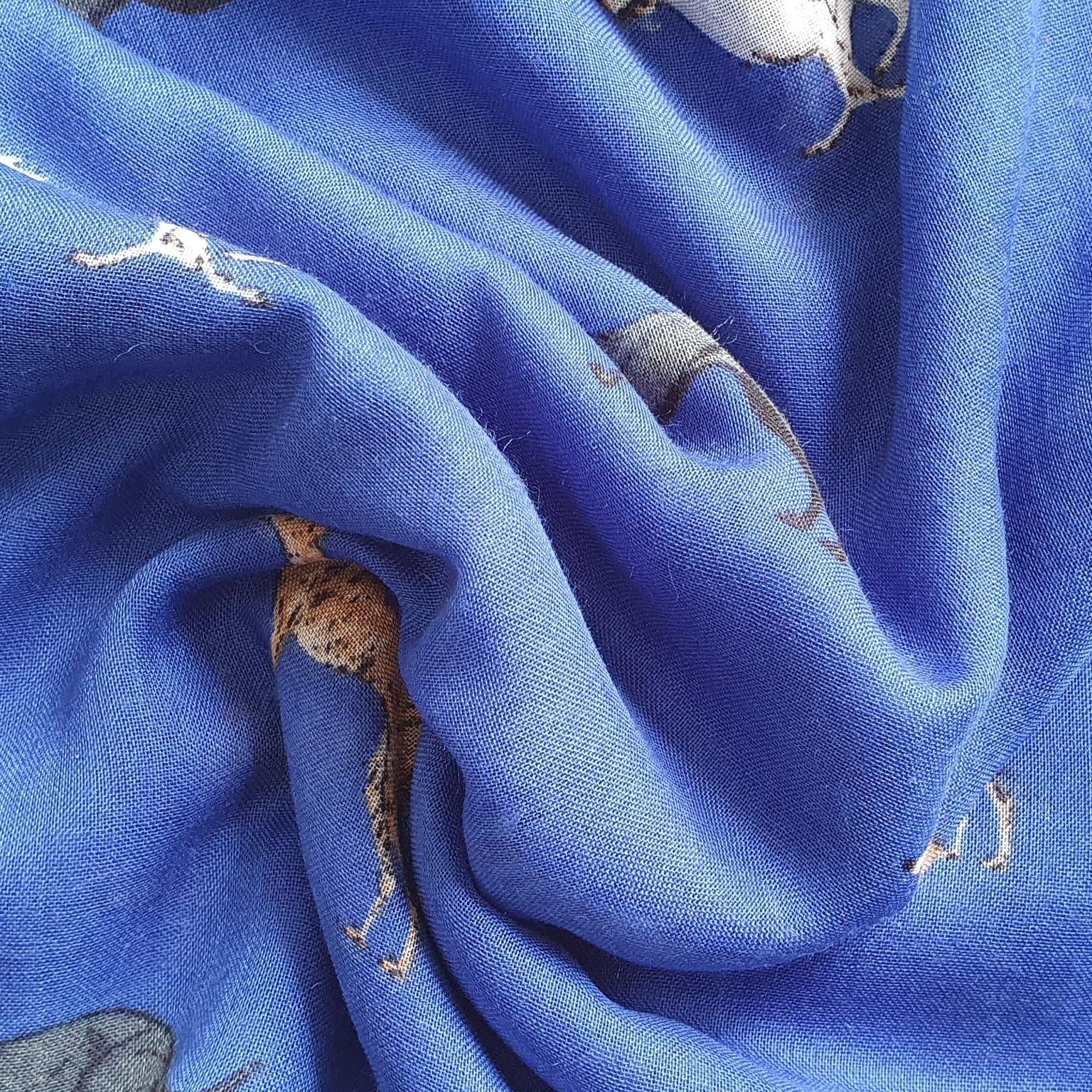 Blue fabric with whippet dog prints