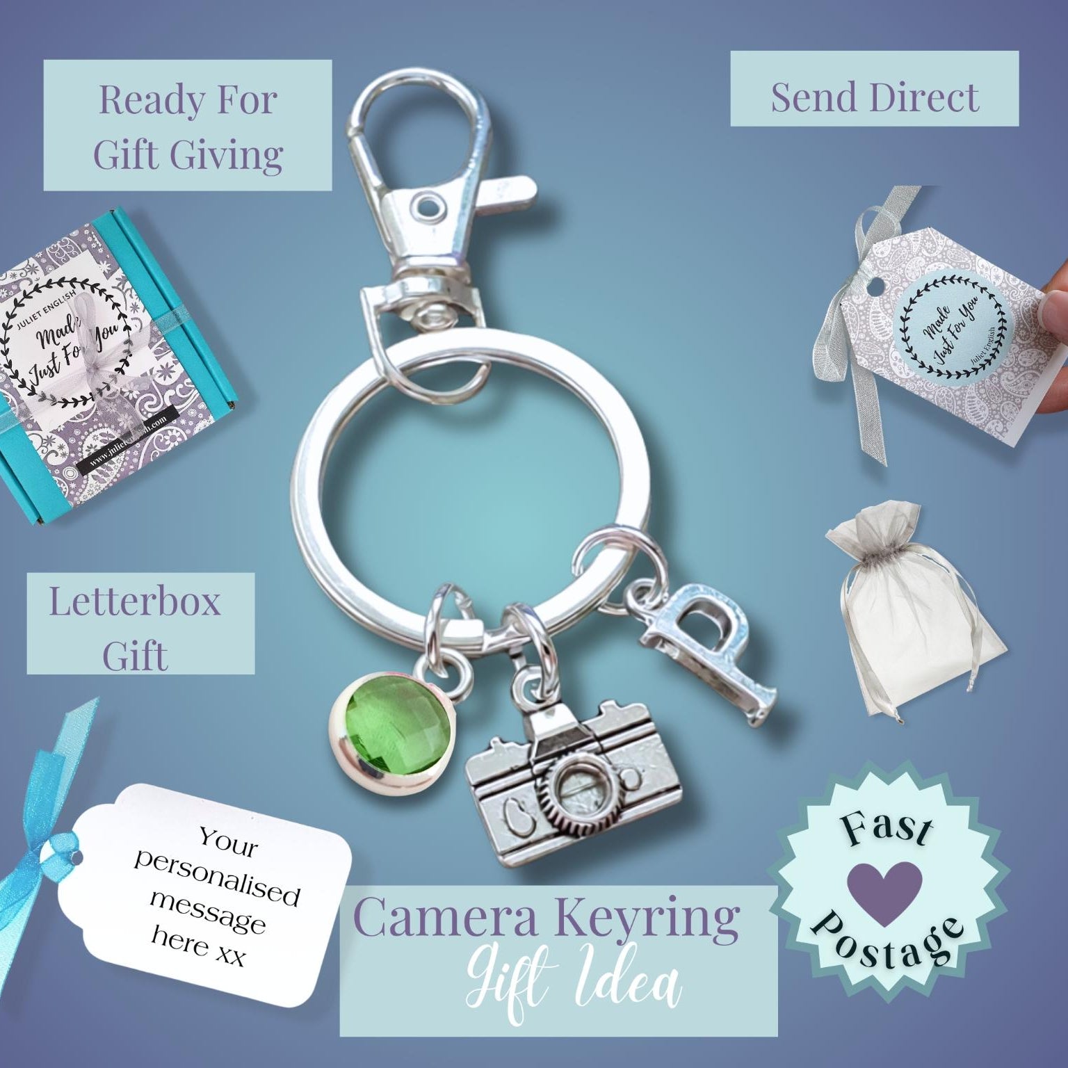 Silver camera keyring with charms, shown with a letterbox, personalized message tag, small pouch, and gift packaging on a blue gradient background with text callouts.