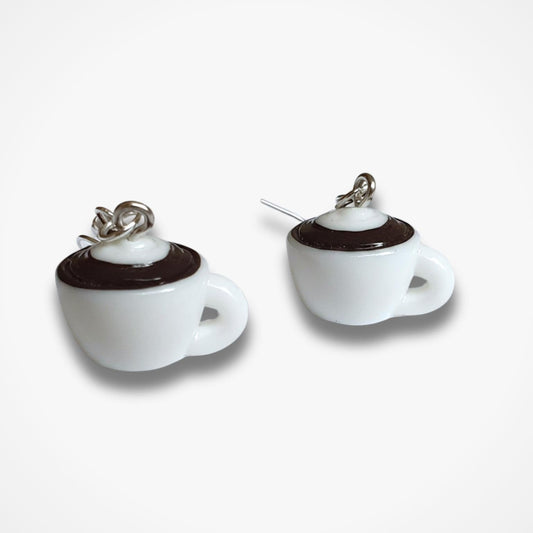 White coffee cup earrings with brown accents on a white background