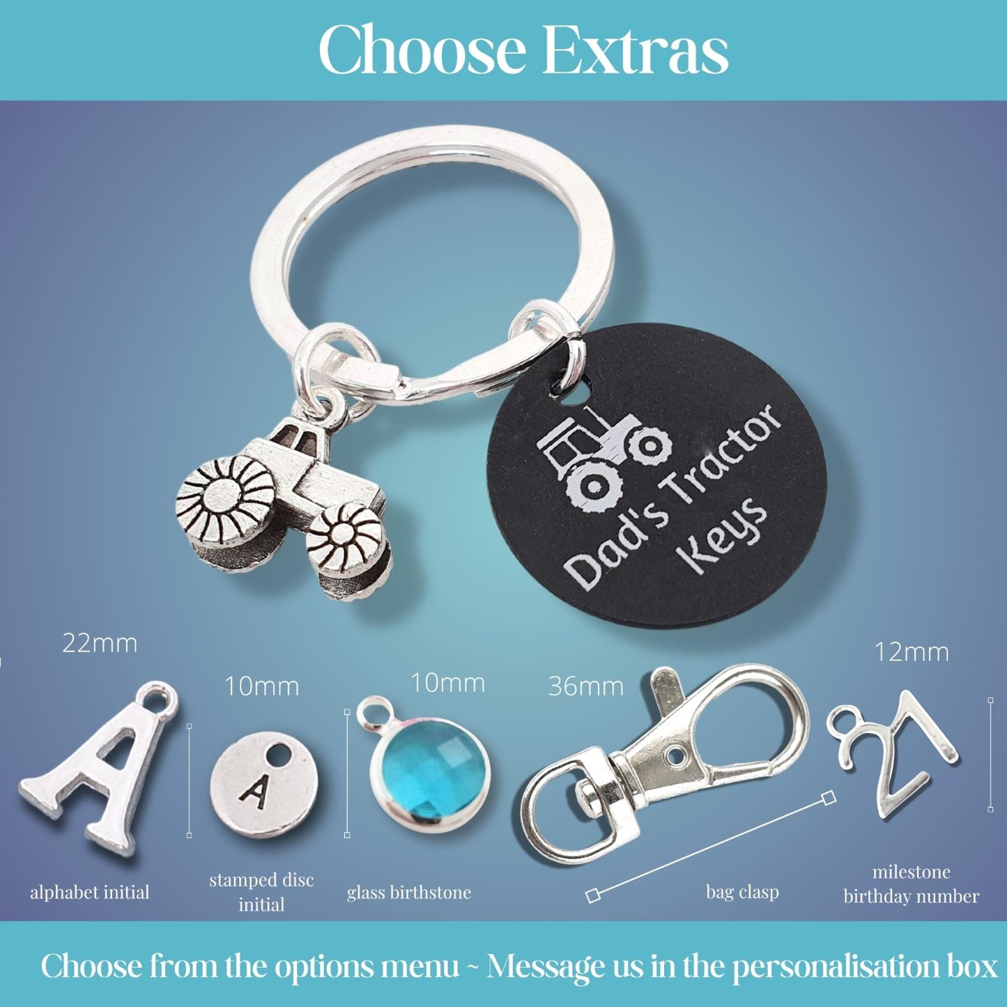 Personalised silver keychain with a tractor charm, a black round tag engraved with 'Dad's Tractor Keys', and an extra keyring shown under the heading 'Choose Extras' on a blue gradient background with size and customization options illustrated below.