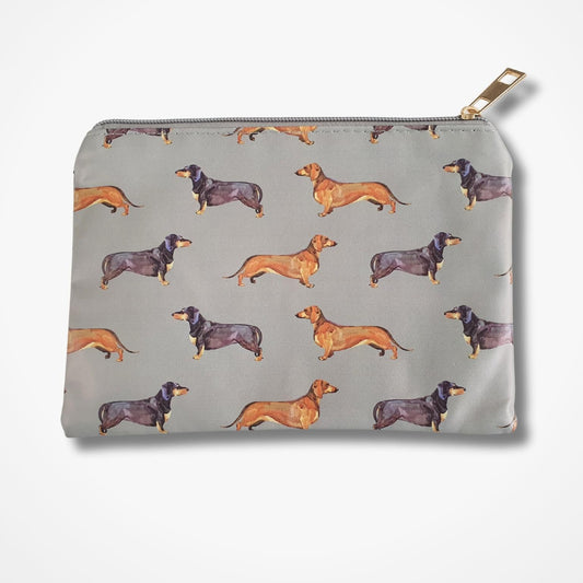 Small bag with dachshund pattern on a grey background