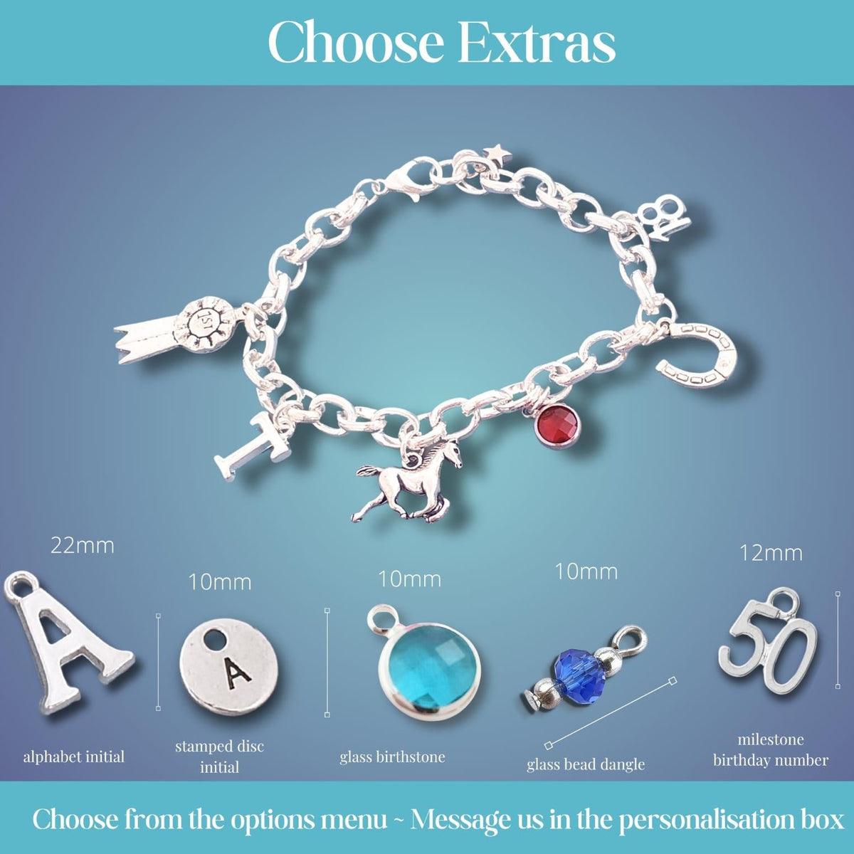 A silver charm bracelet with a horse and rider motif and a small red gemstone, shown on a blue gradient background with text reading 'Choose Extras' and options for custom initial and milestone charms.