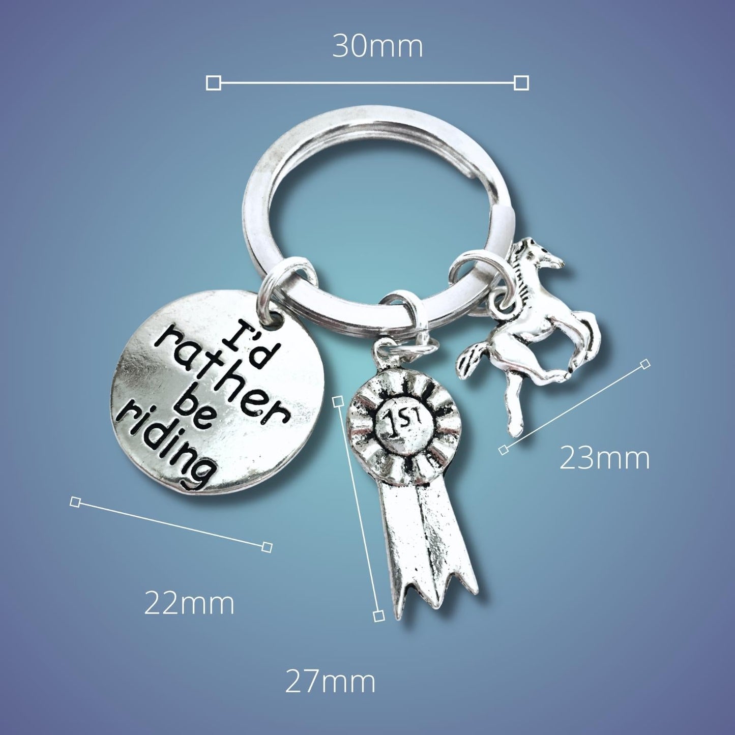 Silver keychain with horse charm and measurement details on a blue background
