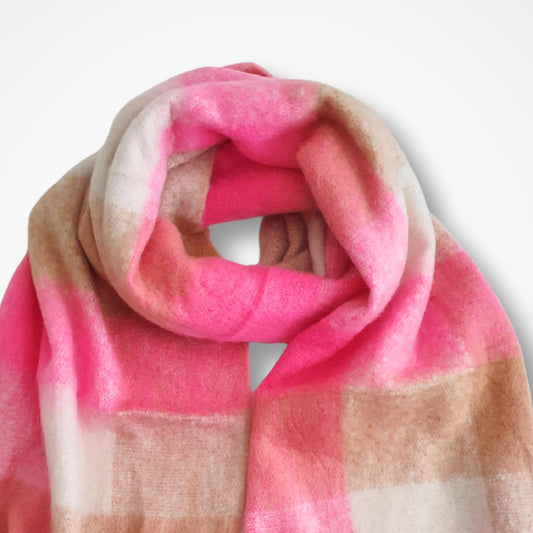 Pink and beige plaid scarf on a white background