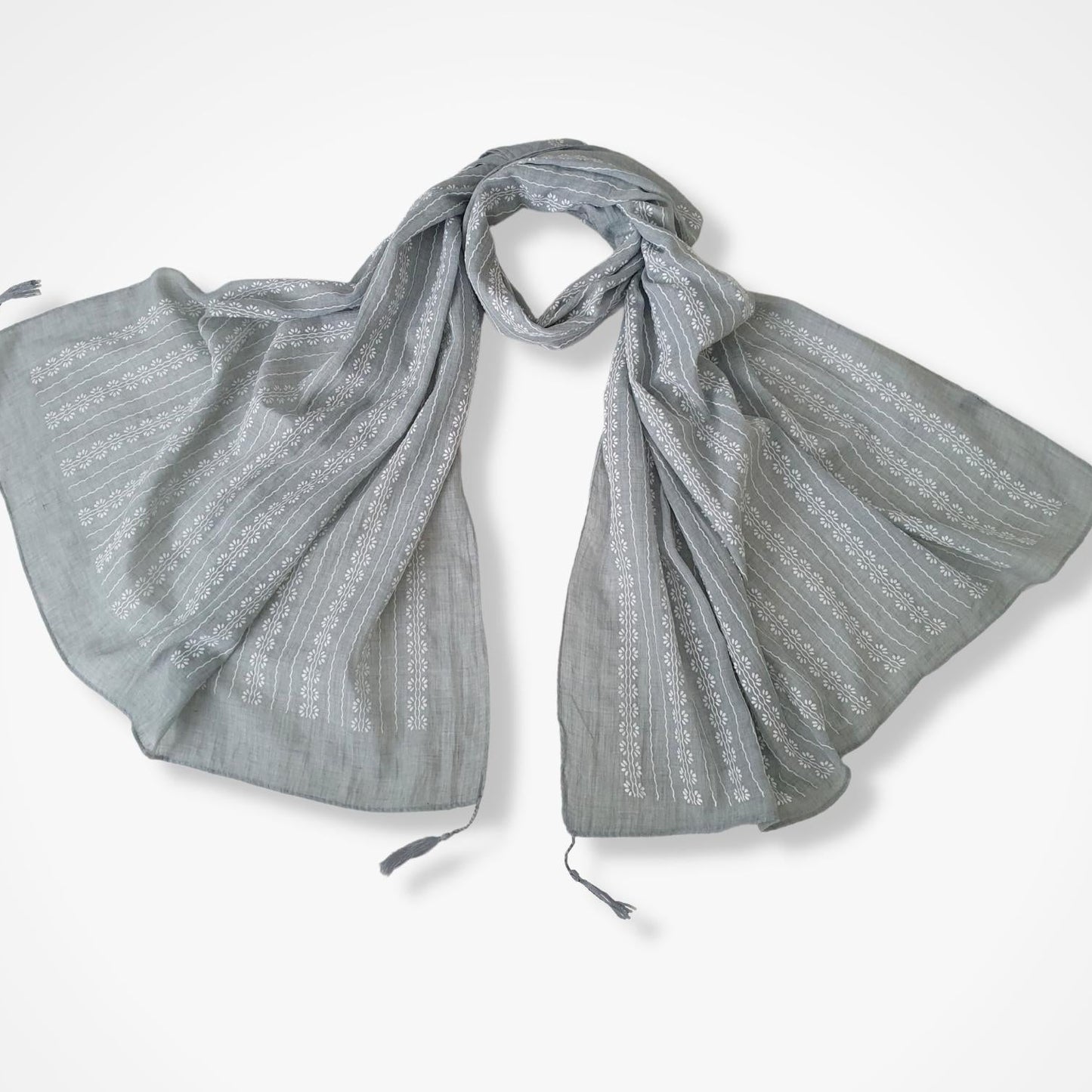 Gray patterned scarf on a white background