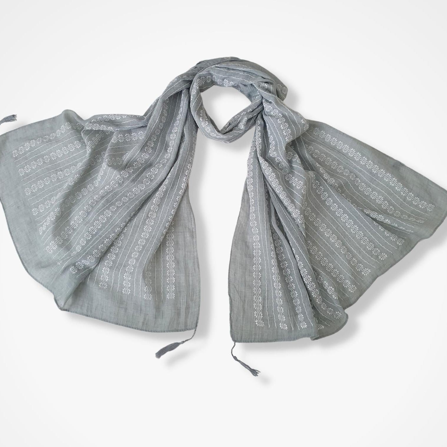 Gray patterned scarf on a white background