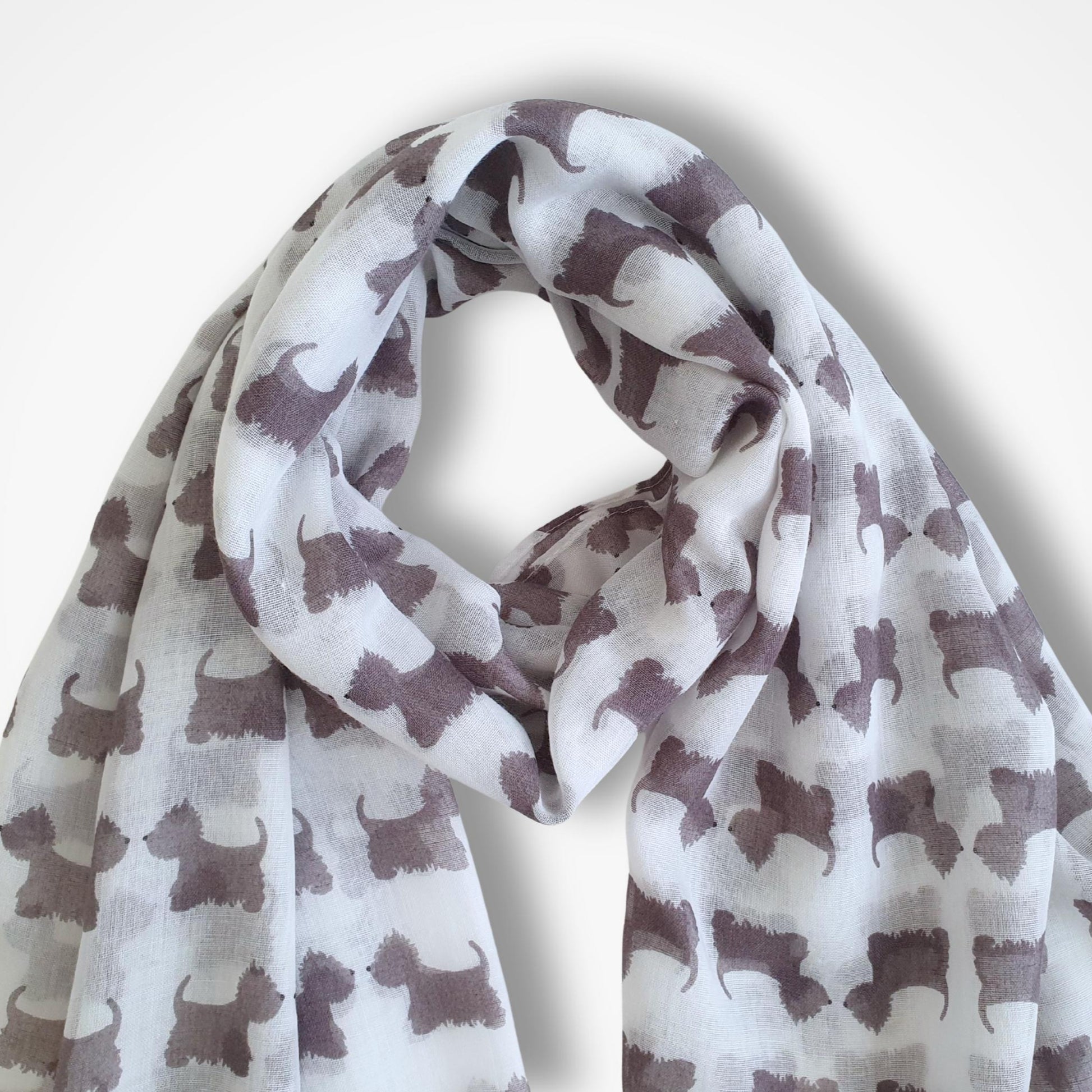Scarf with dog pattern against a white background