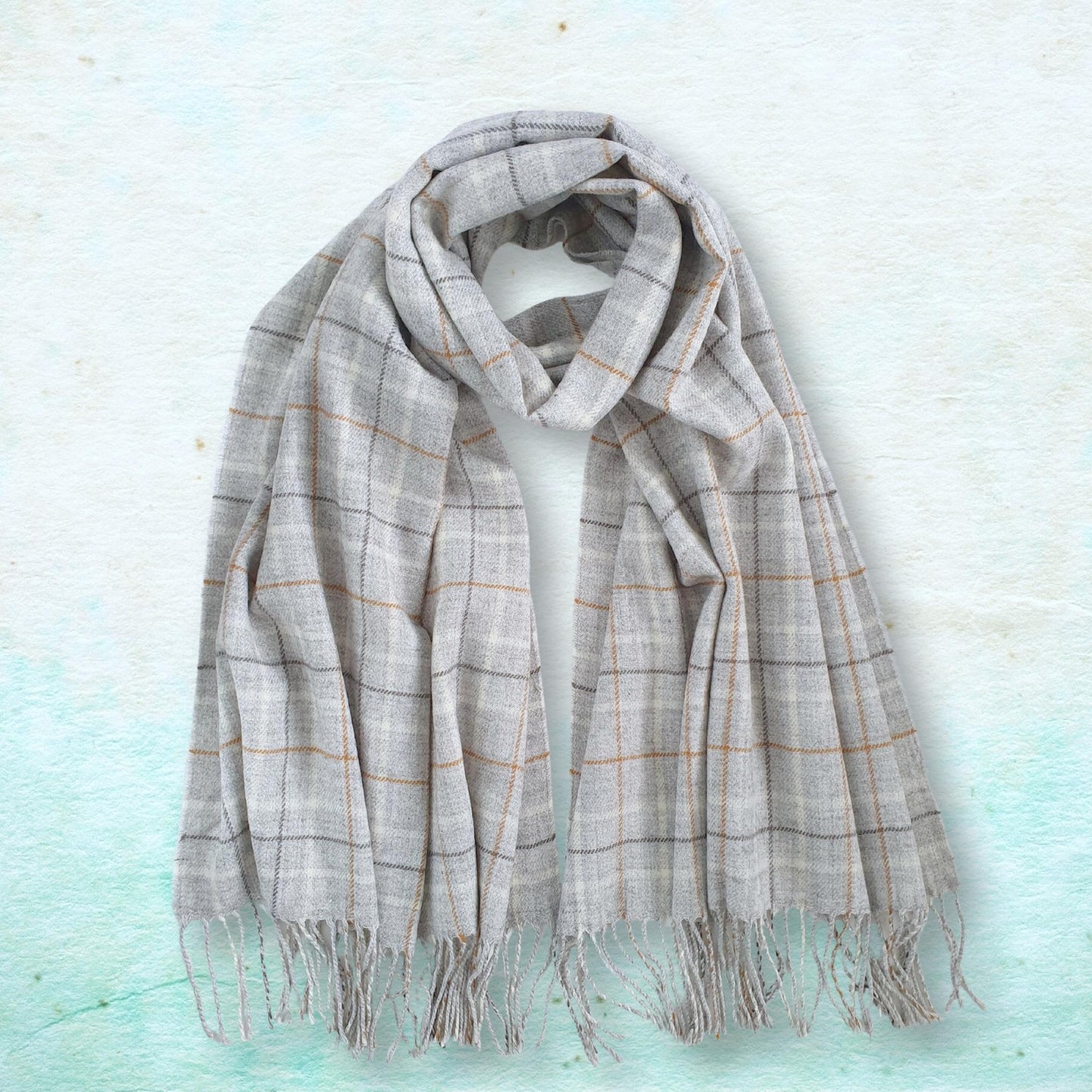 Plaid scarf on a light blue textured background