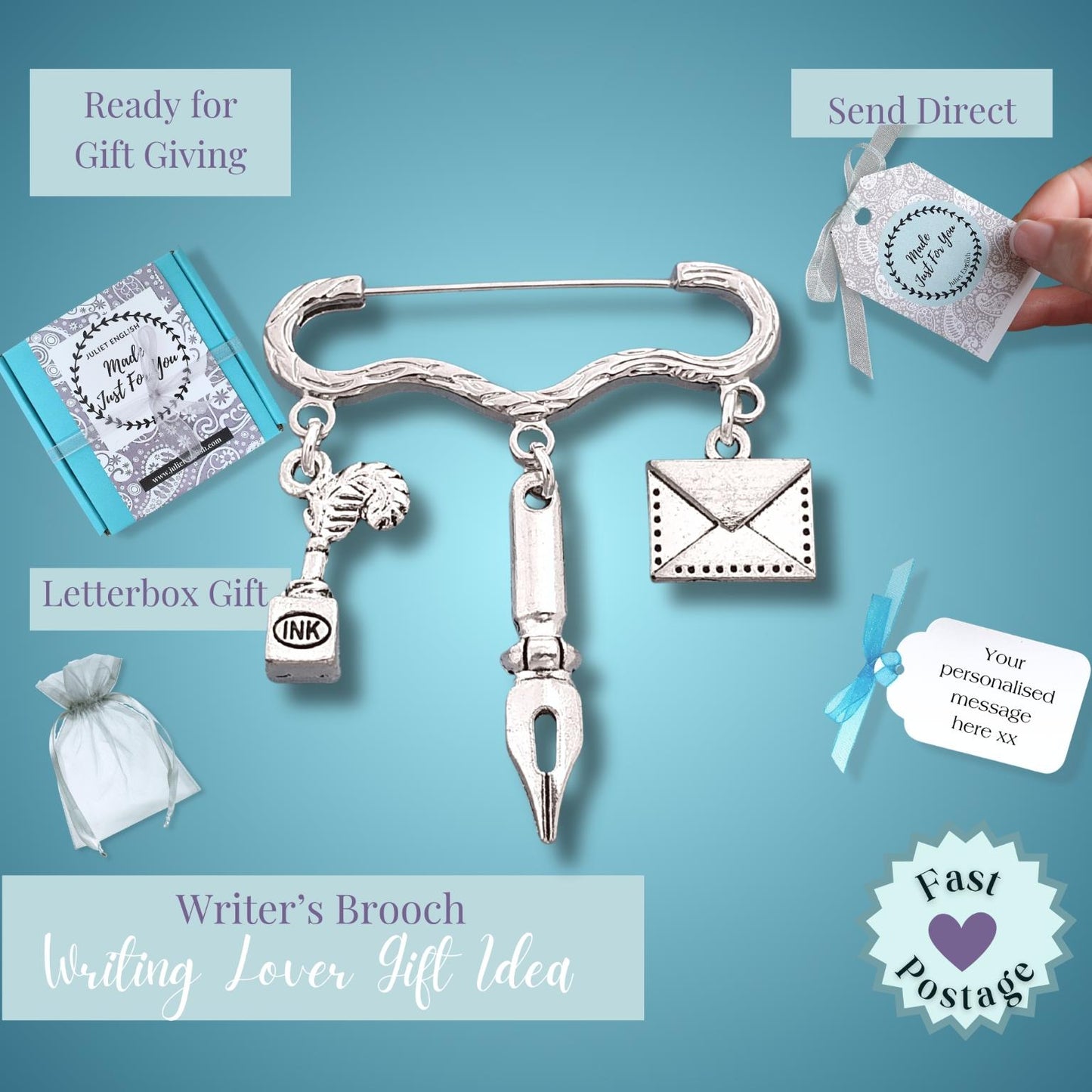 A silver-toned brooch shaped like a pen with hanging charms including a horse, book, letter envelope, and ink drop, shown on a blue background with gift-themed labels and a hand holding a tag.