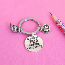 Load image into Gallery viewer, Cup Tea Solves Everything Keyring Silver
