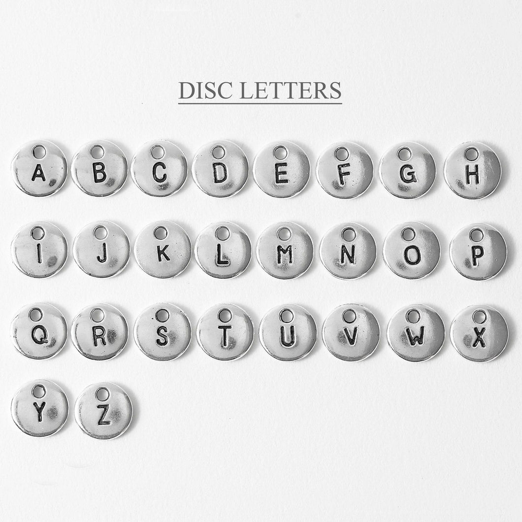 Stamped Disc Letter